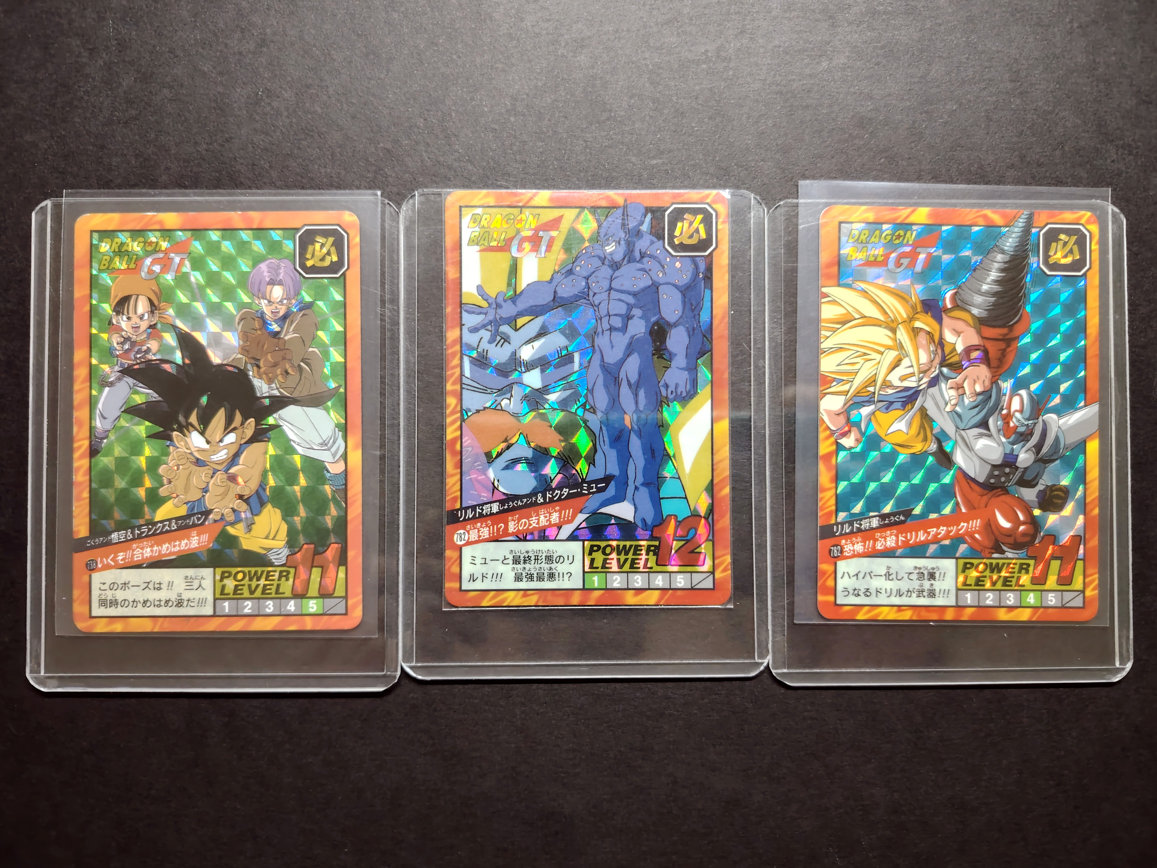 Set of 3 Japanese Super Battle Dragon Ball GT cards n°738 (partially peeled), 782 (unpeeled) and 782 (B) (1996)